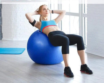 LORDEX gym ball for fitness, blue exercise ball used for workouts and core strengthening, on a gym floor.