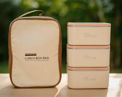 Insulated lunch box set with carry bag, featuring multiple containers and a handle for easy transport, ideal for packed lunches.